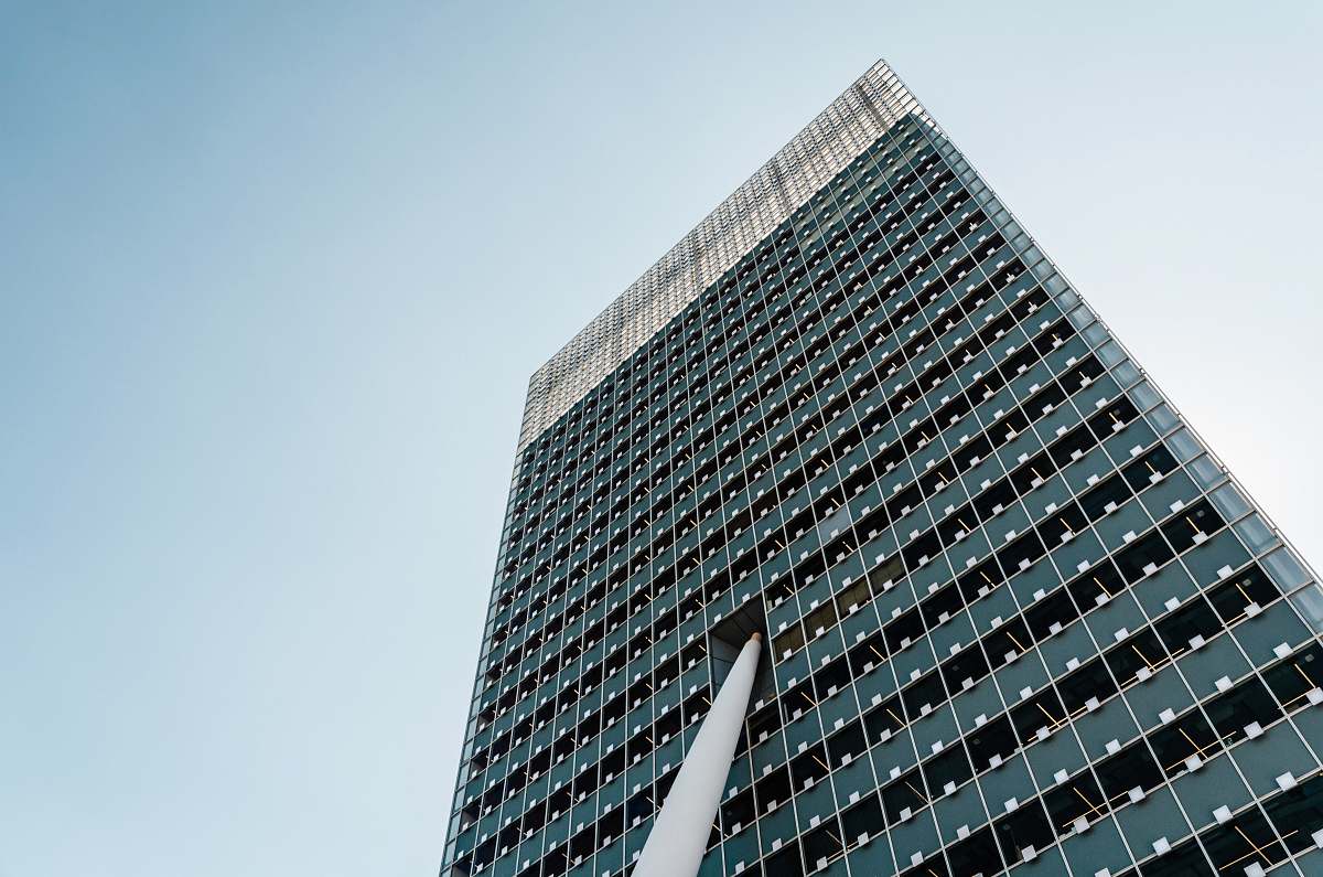 building high-rise building under blue sky city